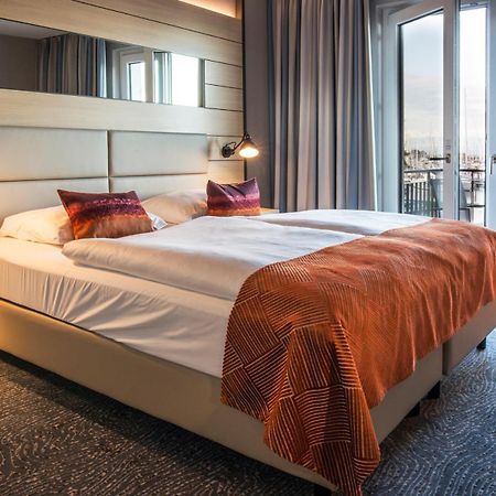 Hafenhotel Meereszeiten Heiligenhafen Esterno foto